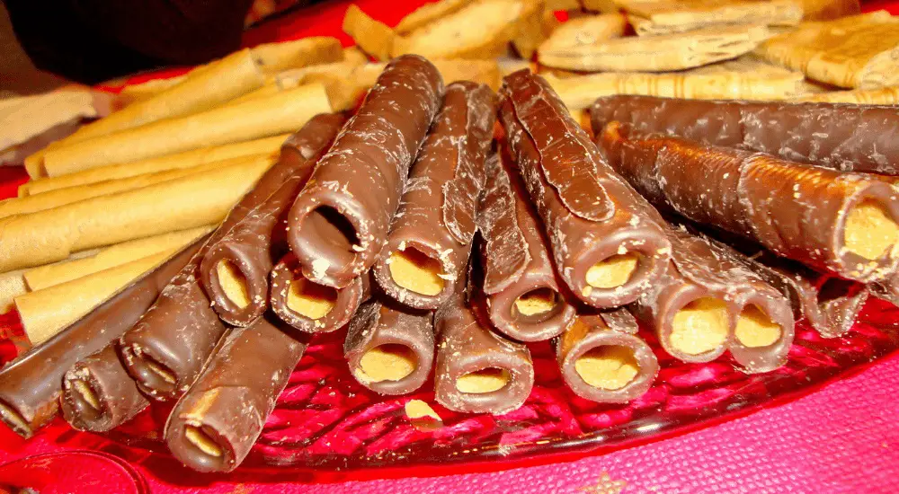 christmas sweets in catalonia on a plate under a red table cloth