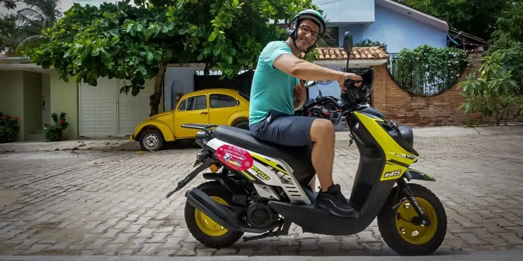 riding a scooter in the rinconada district in puerto escondido