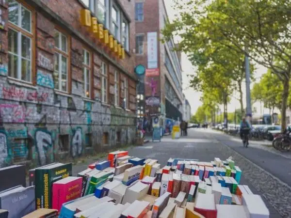 books on the street in plagwitz, germany