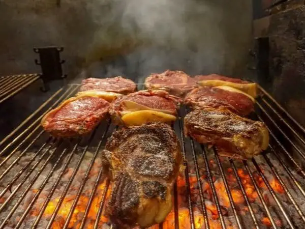 txuleta on the grill at a cider house in astigarraga