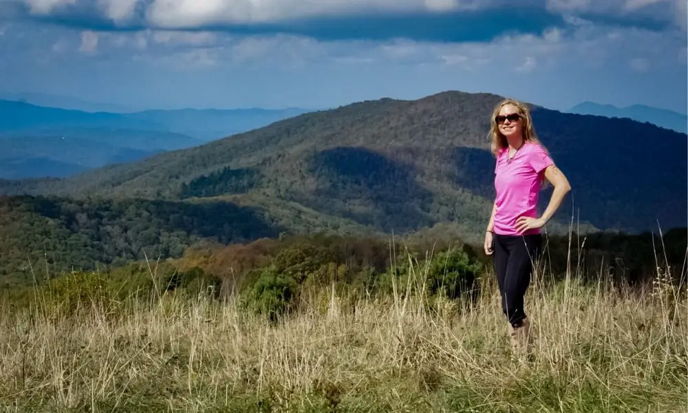 girl hiking in the blue ridge mountains in north carolina